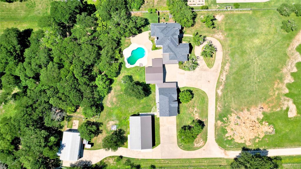 909 Higginbotham Lane China Spring, TX 76633 - Photo 39 of 40 an aerial view of a house with a yard and swimming pool