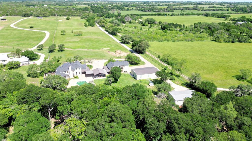 909 Higginbotham Lane China Spring, TX 76633 - Photo 40 of 40 an aerial view of residential houses with outdoor space and trees all around