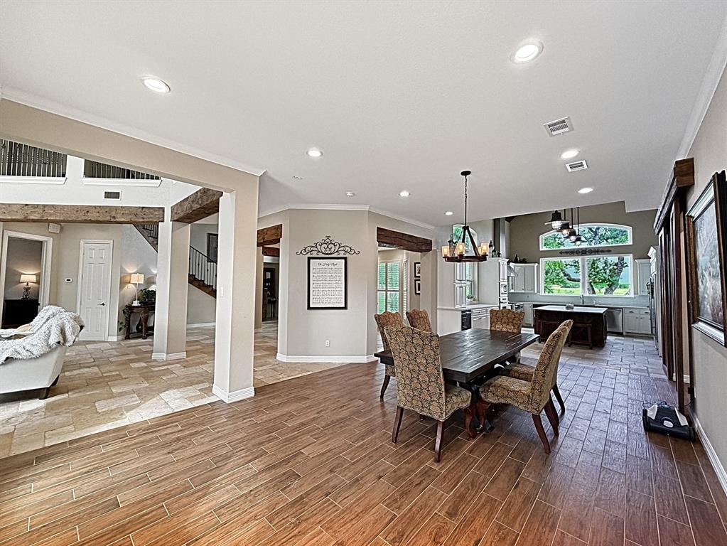 909 Higginbotham Lane China Spring, TX 76633 - Photo 9 of 40 a dining room with furniture and wooden floor