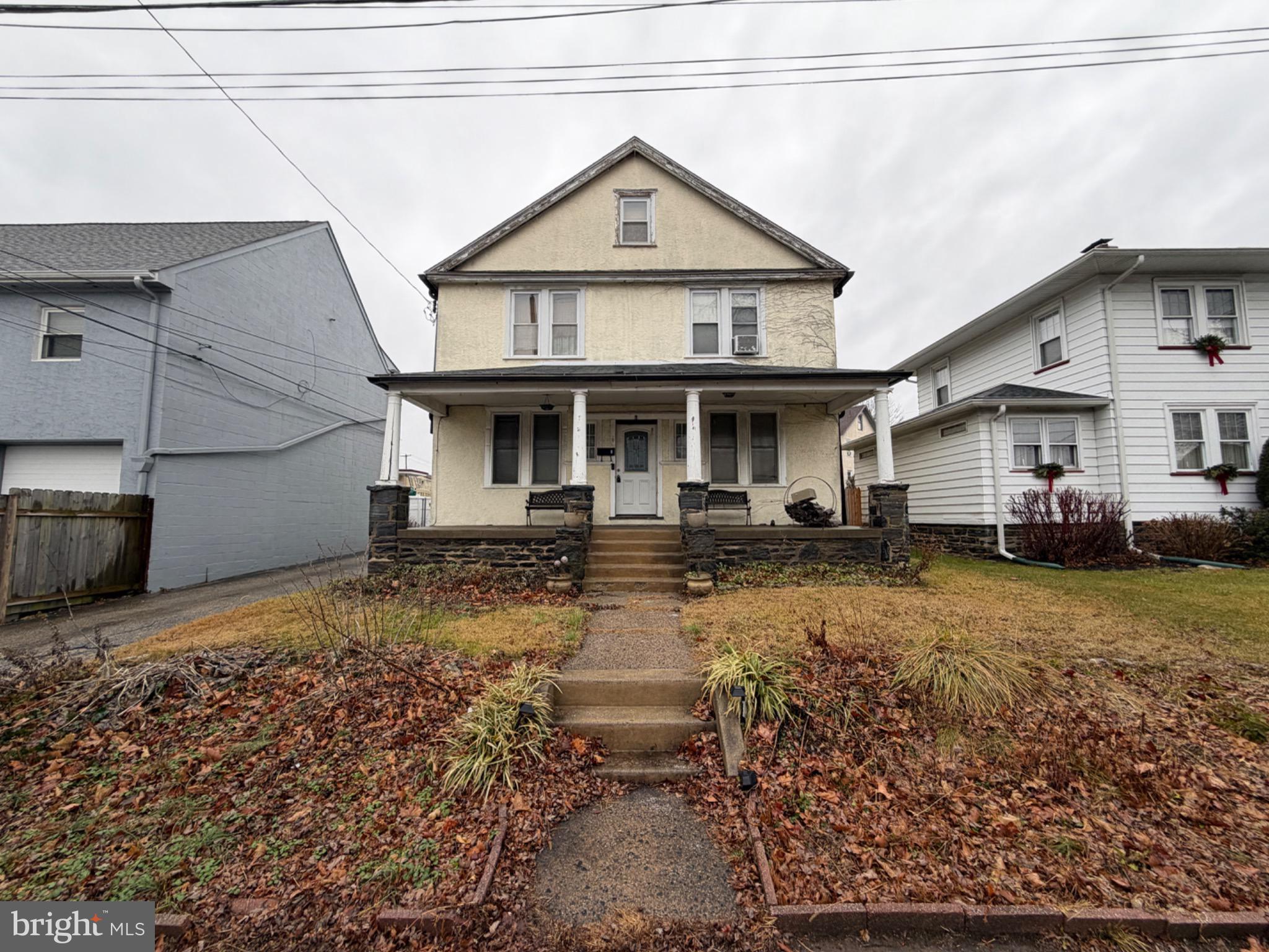 6 North Brighton Avenue Upper Darby, PA 19082 - Photo 1 of 1 a front view of a house with a yard