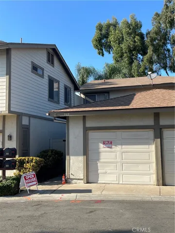 a view of a house with a garage
