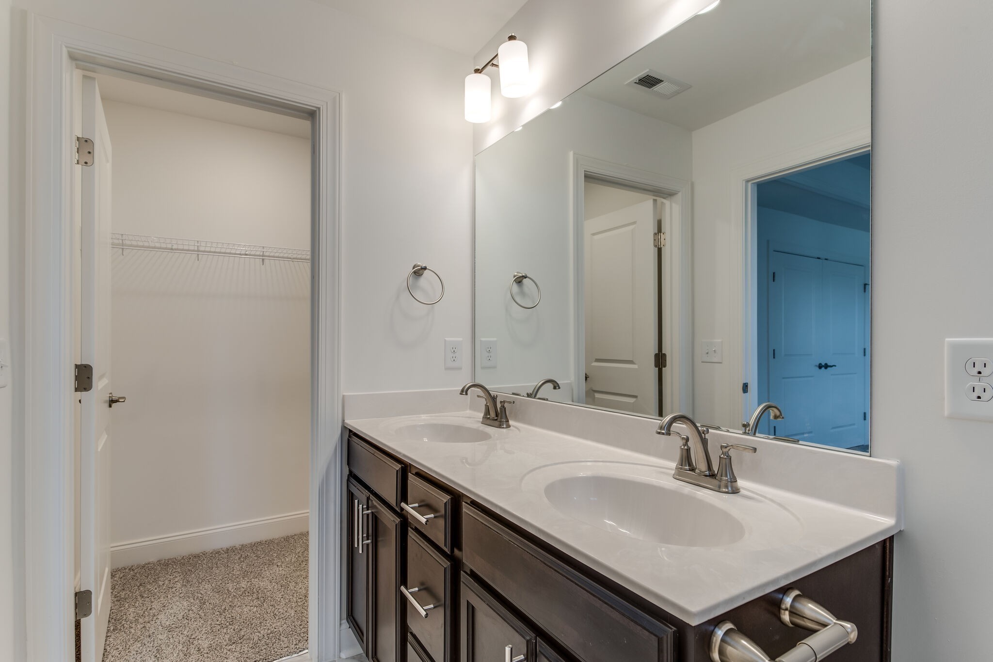 923 Southeast Broad Street, Unit B2 Murfreesboro, TN 37130 - Photo 28 of 32 a bathroom with a sink and a mirror