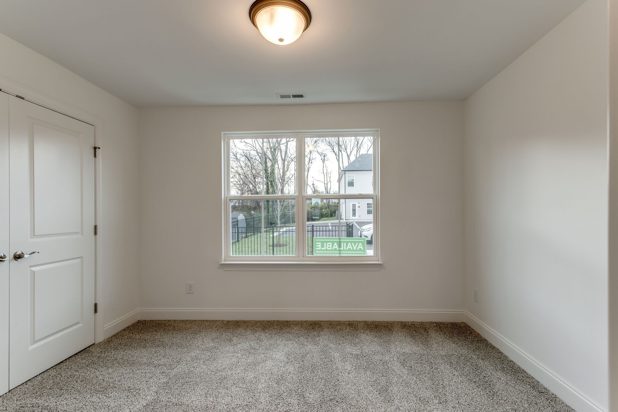 923 Southeast Broad Street, Unit B2 Murfreesboro, TN 37130 - Photo 29 of 32 an empty room with a window