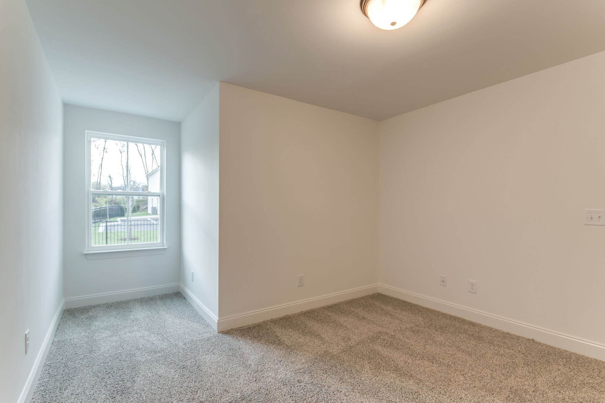923 Southeast Broad Street, Unit B2 Murfreesboro, TN 37130 - Photo 31 of 32 an empty room with a window