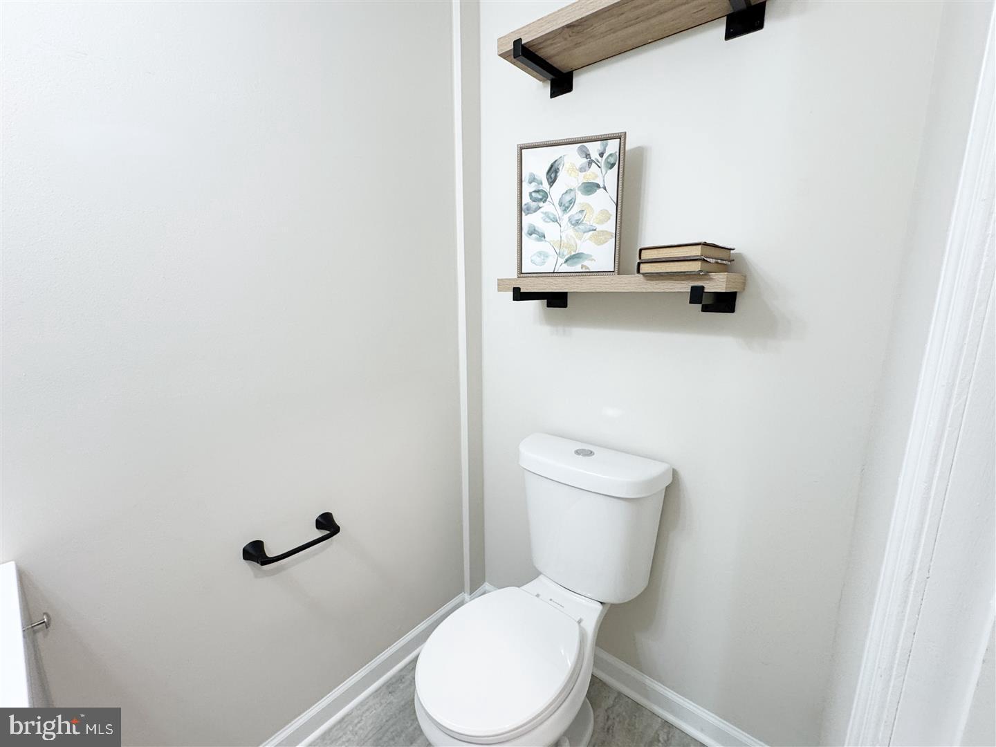260 Gibbons Road Springfield, PA 19064 - Photo 24 of 31 a white toilet sitting next to a bathroom sink