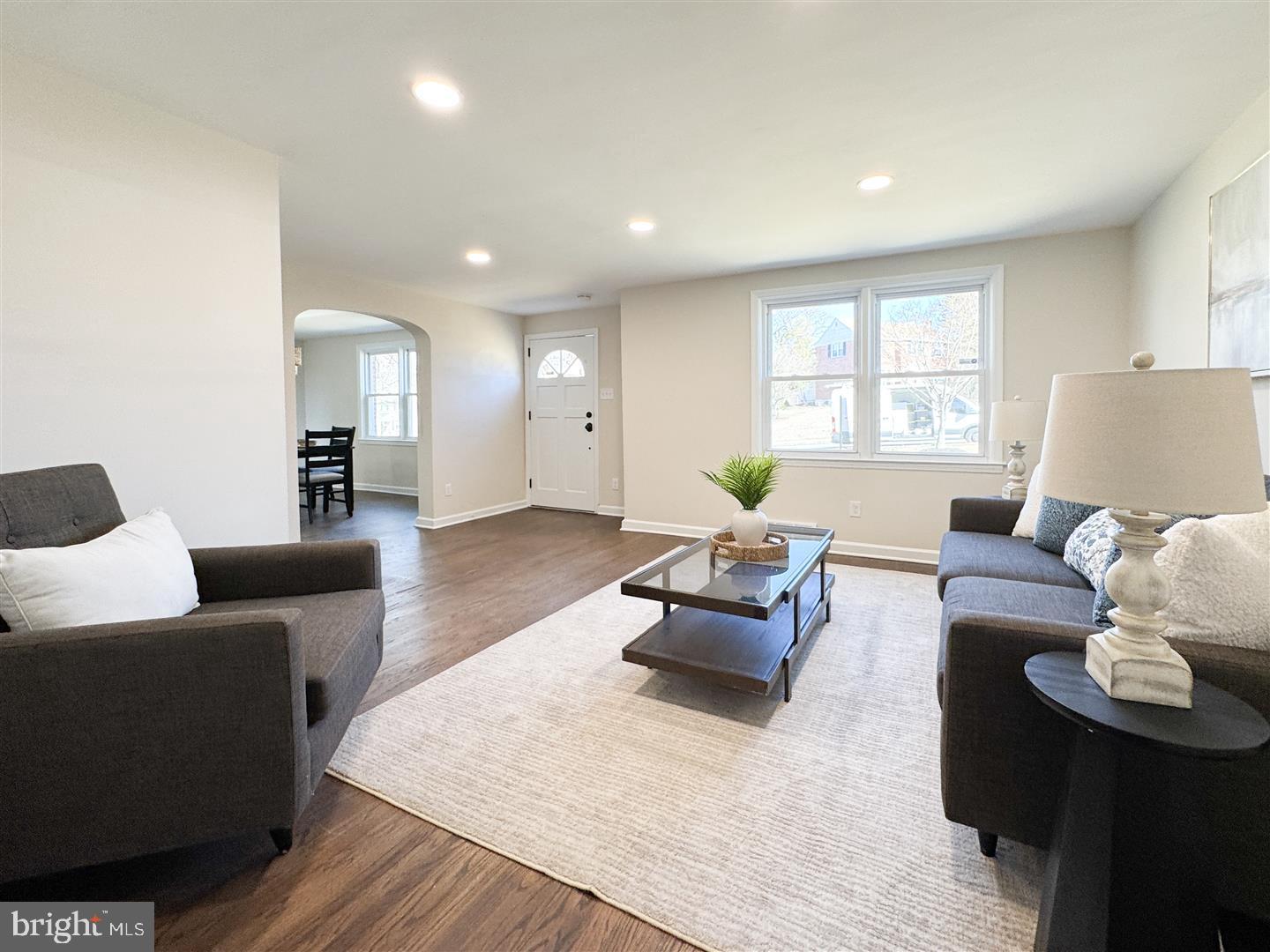 260 Gibbons Road Springfield, PA 19064 - Photo 6 of 31 a living room with furniture and a large window