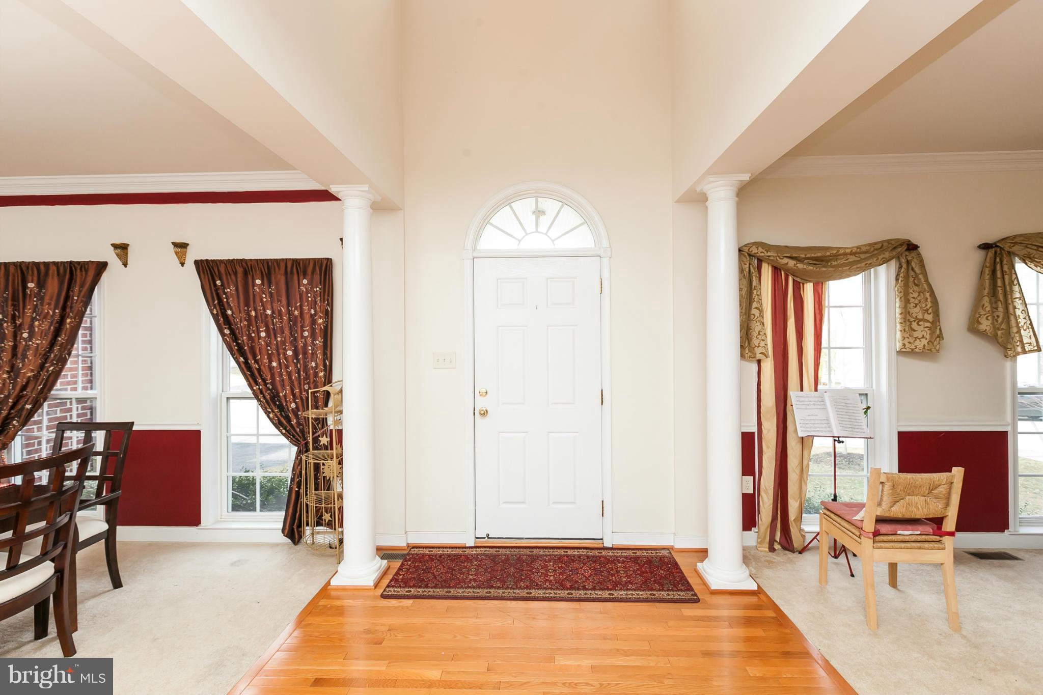 8339 Academy Road Ellicott City, MD 21043 - Photo 2 of 29 2 STORY FOYER ,9 FT CEILING ON MAIN LEV.