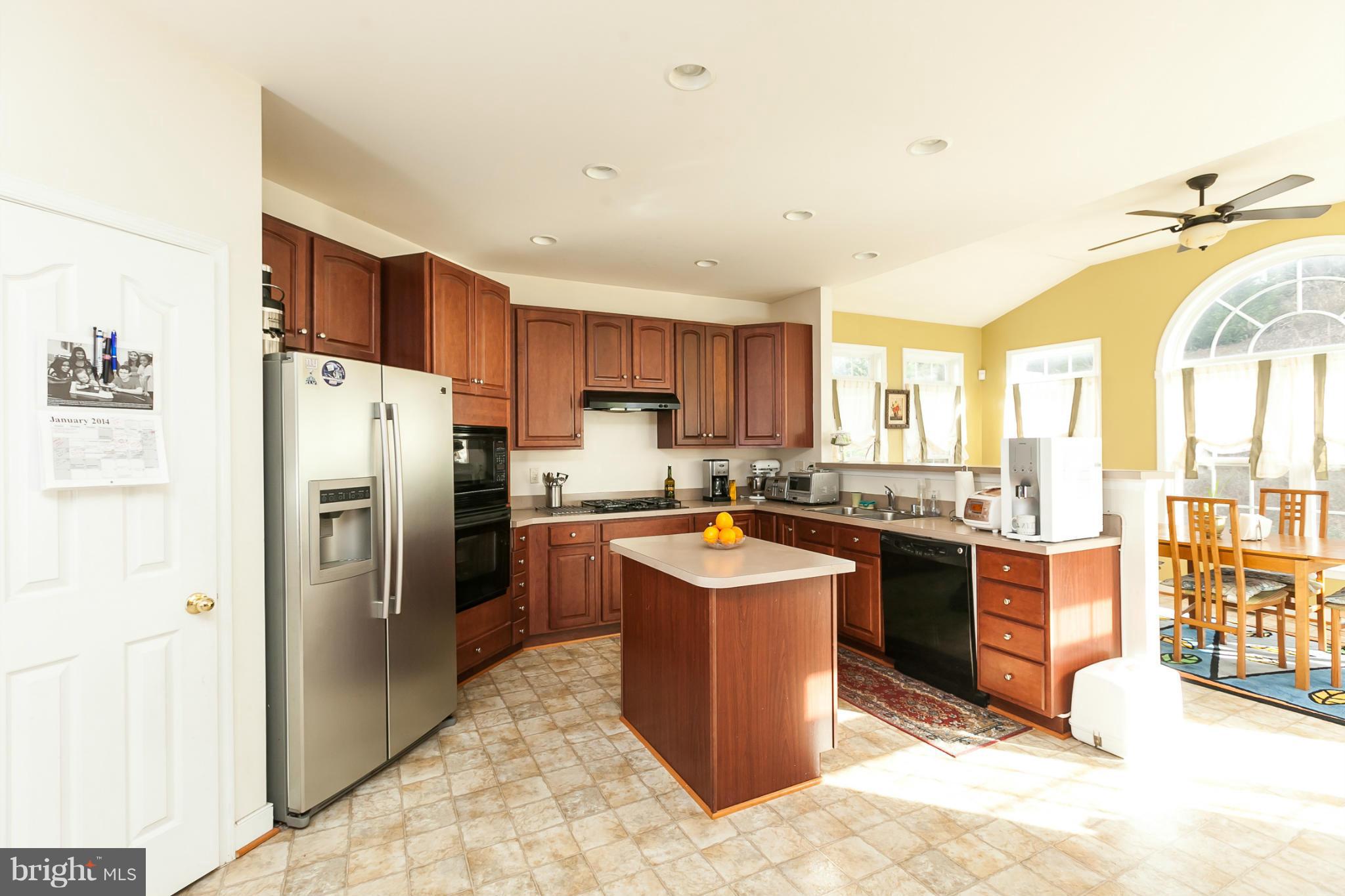 8339 Academy Road Ellicott City, MD 21043 - Photo 12 of 29 Kitchen OPEN TO FULL SIZE SUNROOM