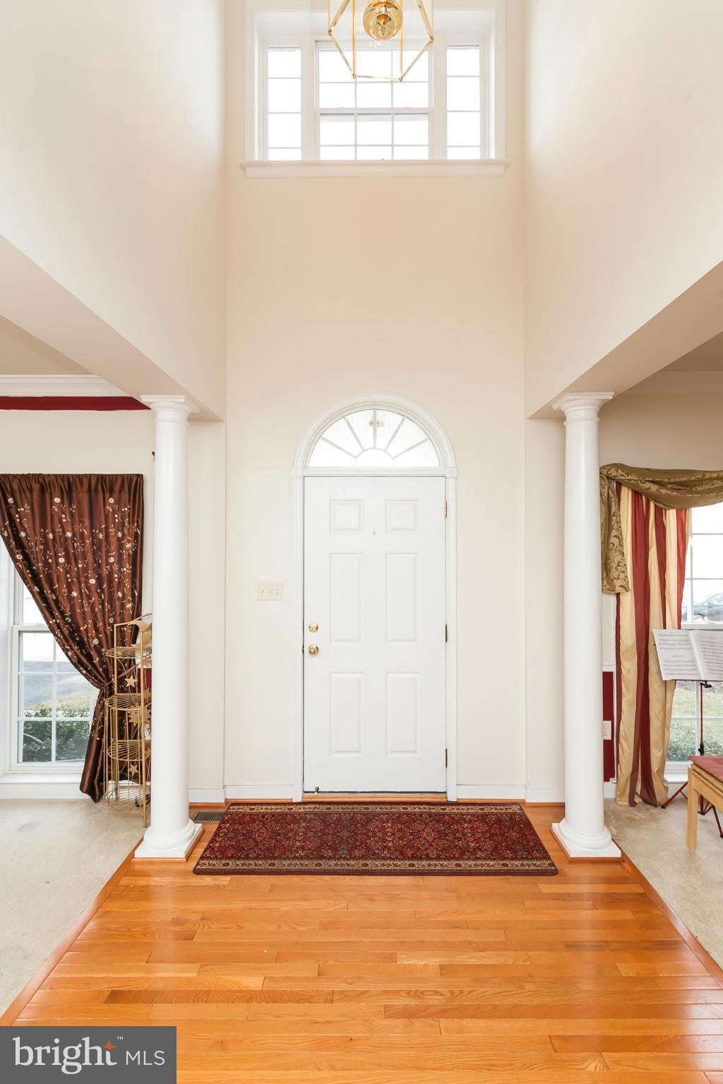 8339 Academy Road Ellicott City, MD 21043 - Photo 4 of 29 HARDWOOD IN FOYER