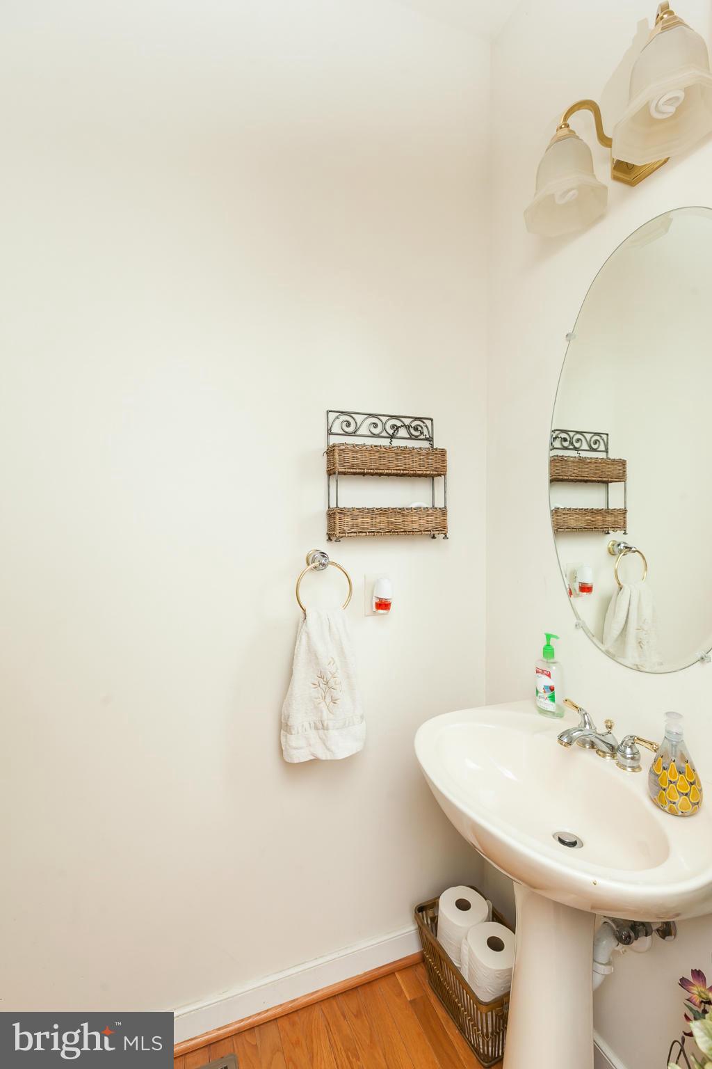 8339 Academy Road Ellicott City, MD 21043 - Photo 6 of 29 POWDER ROOM ON MAIN LEV.