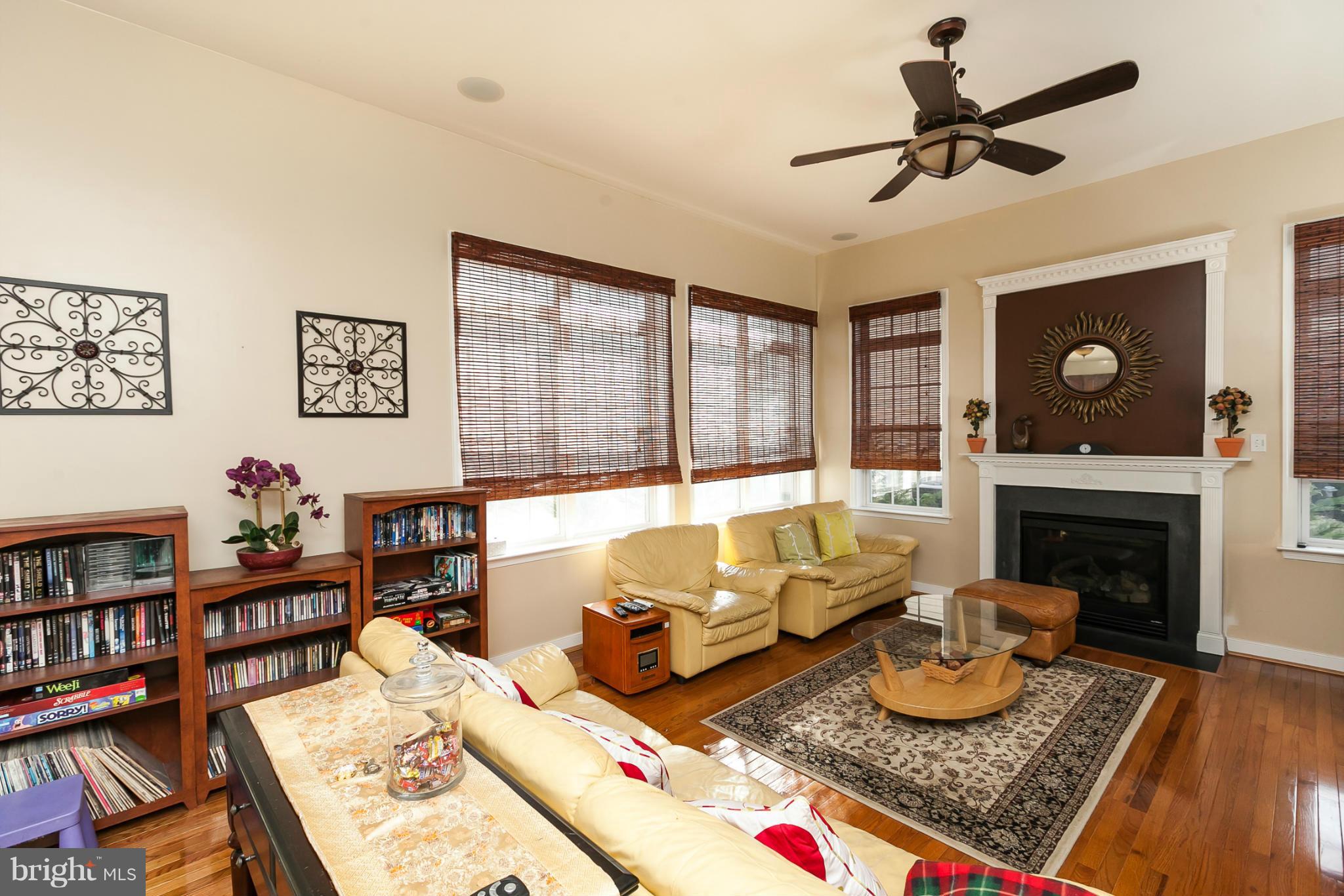 8339 Academy Road Ellicott City, MD 21043 - Photo 8 of 29 Family Room W/HARDWOOD FLR.& GAS FIREPLACE