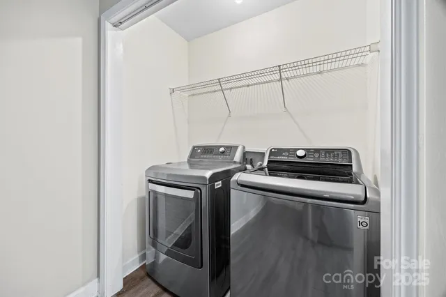 a utility room with dryer and washer