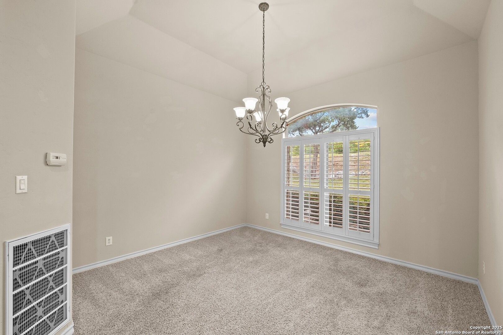 14041 Iron Horse Way Helotes, TX 78023 - Photo 13 of 49 a view of a livingroom with a chandelier