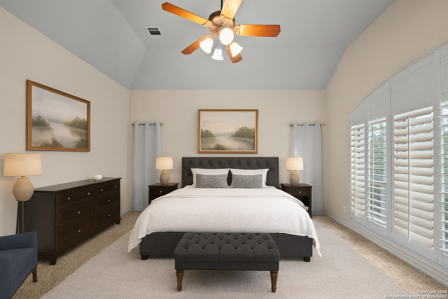 14041 Iron Horse Way Helotes, TX 78023 - Photo 14 of 49 a bed sitting in a bedroom next to a window