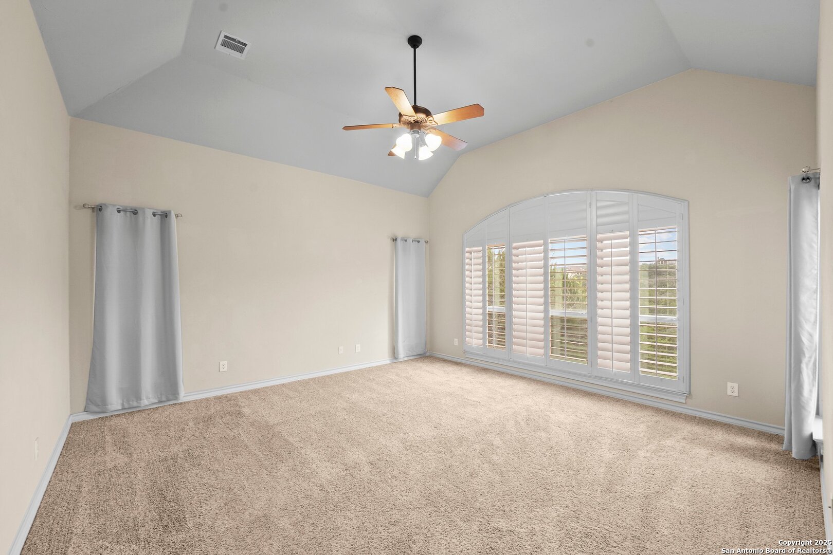 14041 Iron Horse Way Helotes, TX 78023 - Photo 16 of 49 a view of an empty room with a window