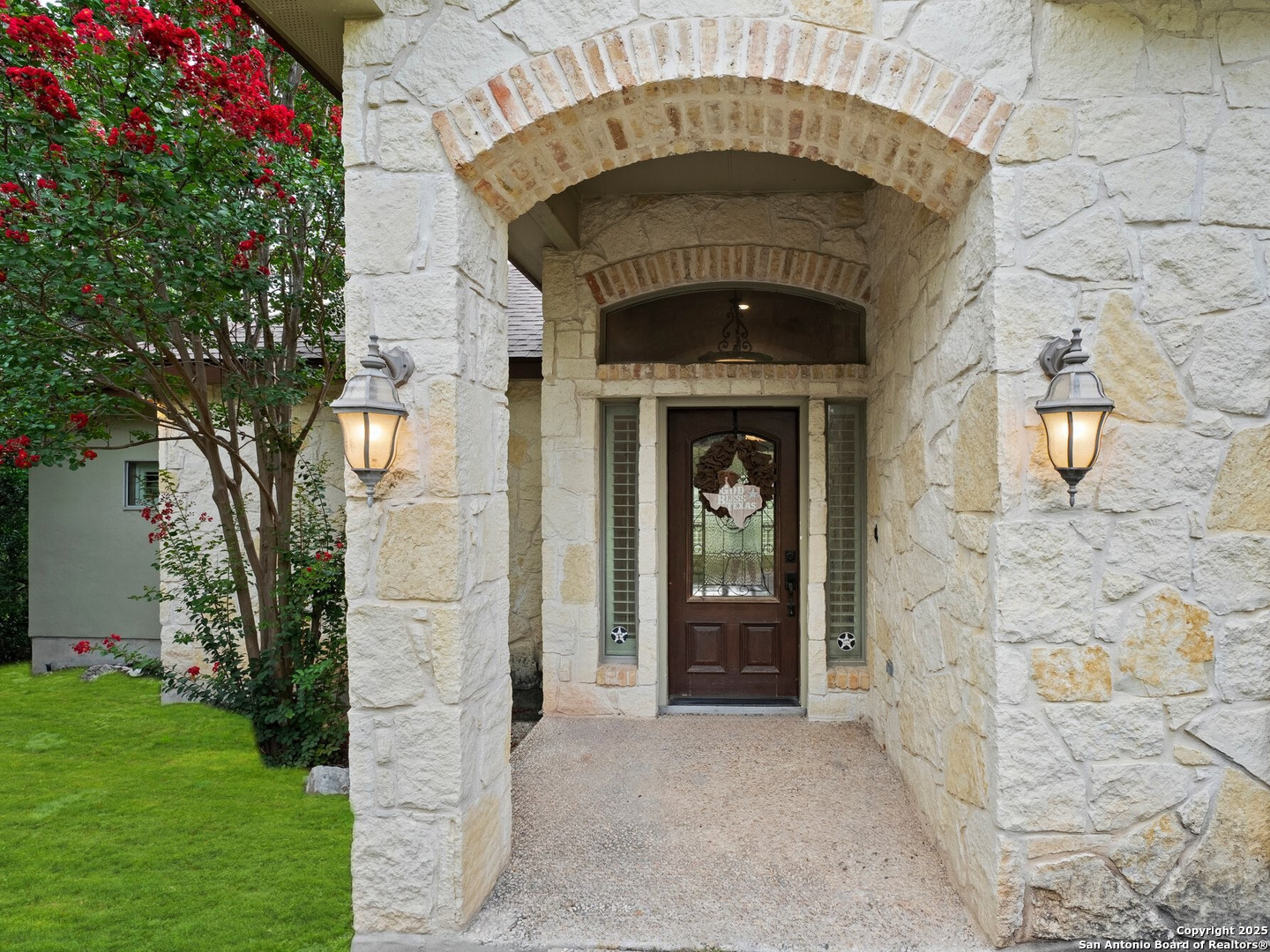 14041 Iron Horse Way Helotes, TX 78023 - Photo 2 of 49 a stone house with a outdoor space