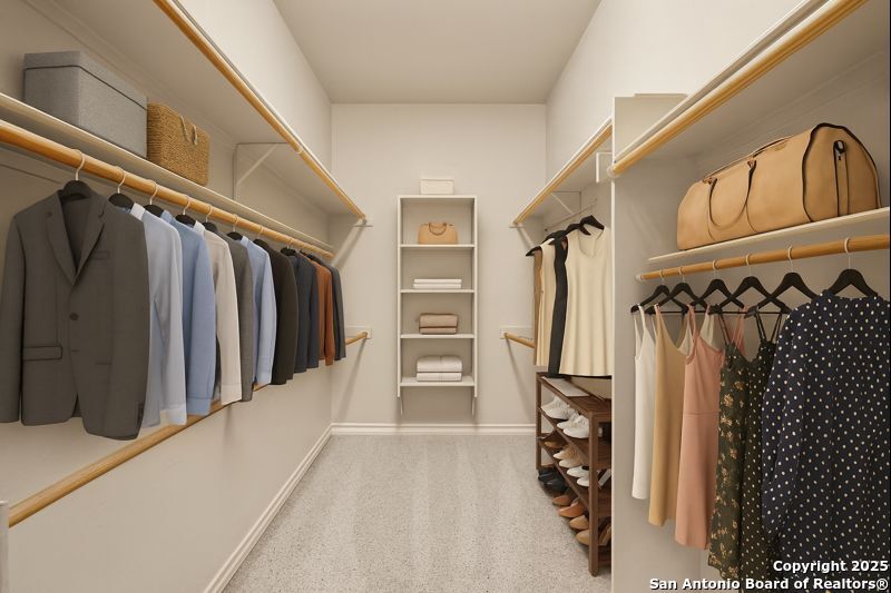 14041 Iron Horse Way Helotes, TX 78023 - Photo 23 of 49 a view of walk in closet with clothes