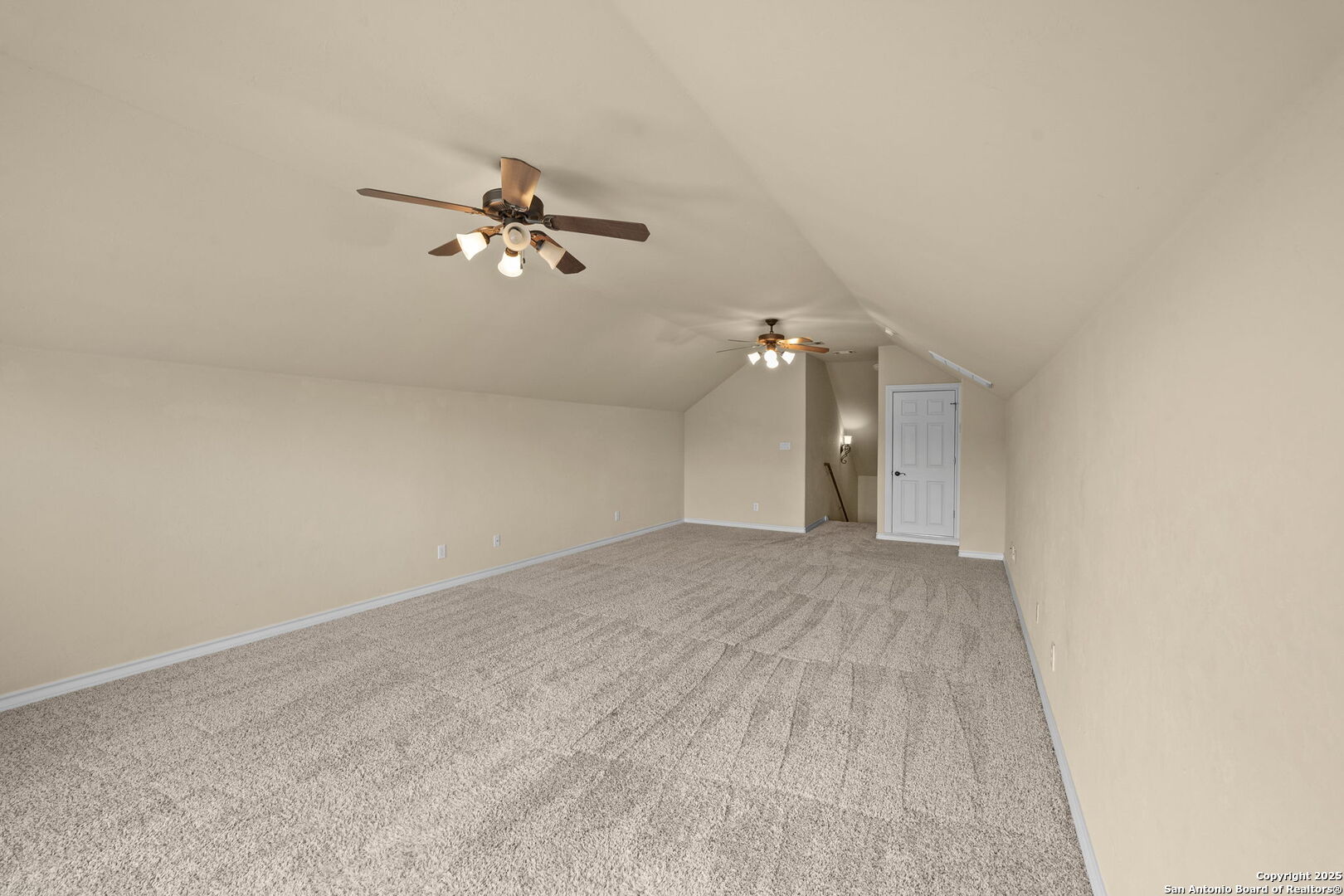 14041 Iron Horse Way Helotes, TX 78023 - Photo 32 of 49 a view of a big room with carpet
