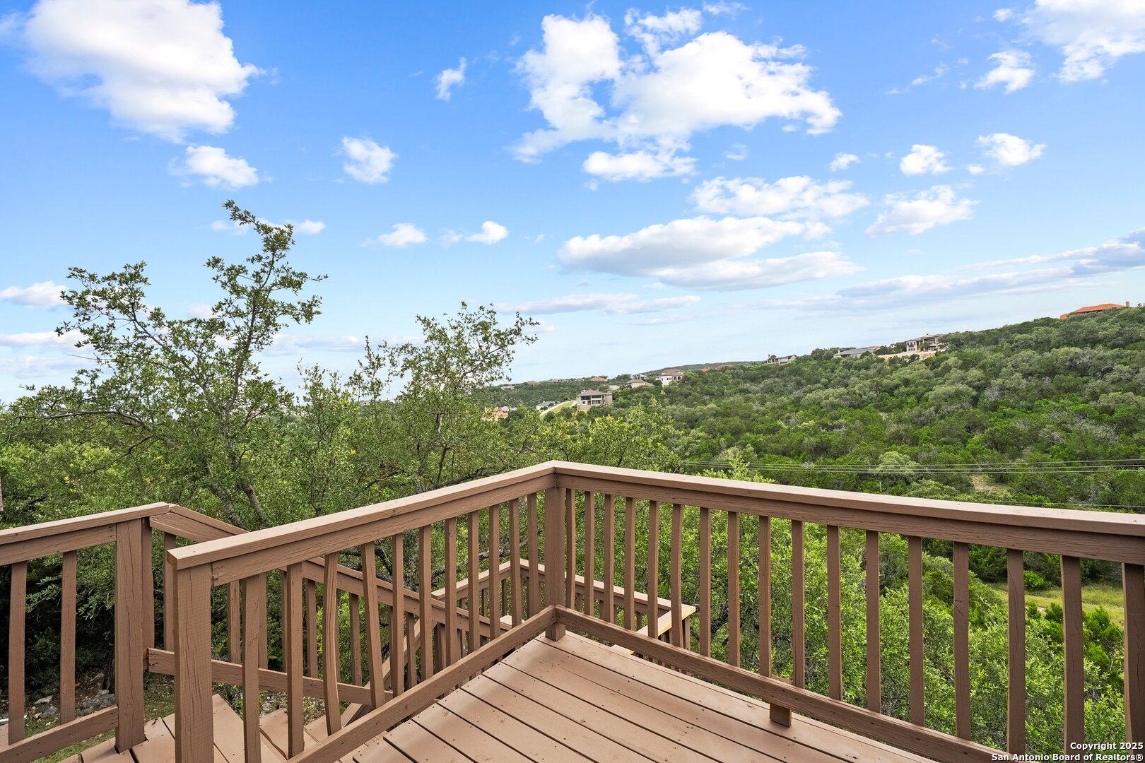 14041 Iron Horse Way Helotes, TX 78023 - Photo 38 of 49 a view of balcony with wooden floor