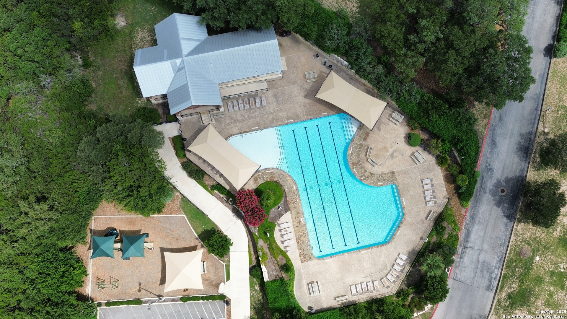 14041 Iron Horse Way Helotes, TX 78023 - Photo 40 of 49 an aerial view of a house with outdoor space and sitting area