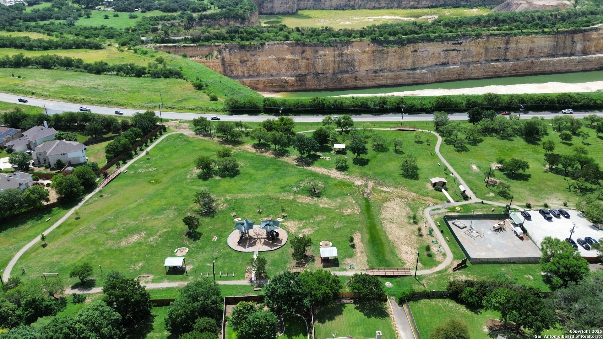 14041 Iron Horse Way Helotes, TX 78023 - Photo 45 of 49 a view of a garden with a bench