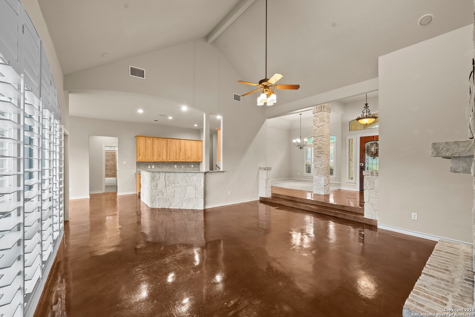 14041 Iron Horse Way Helotes, TX 78023 - Photo 7 of 49 a view of a living room and chandelier