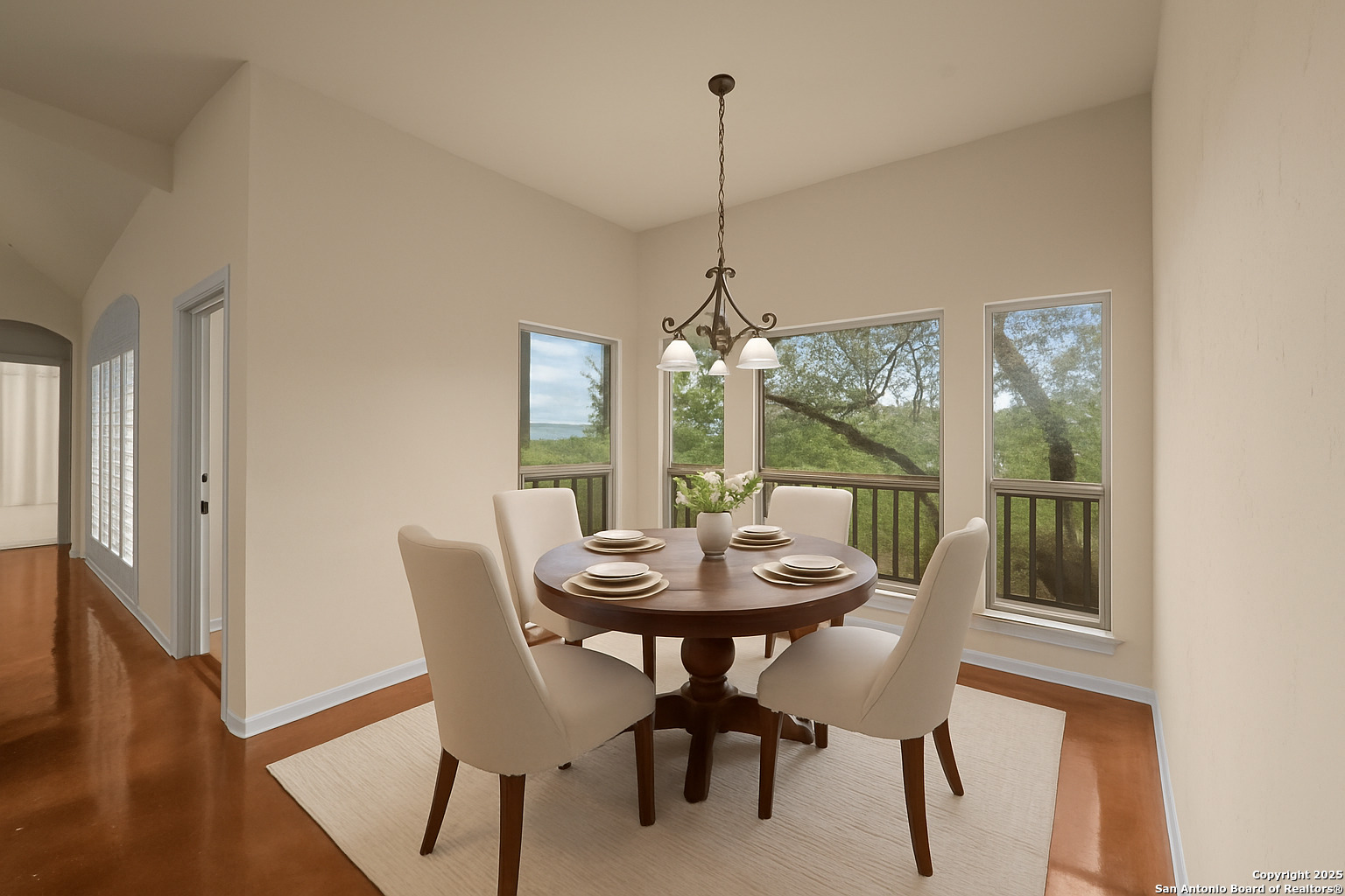 14041 Iron Horse Way Helotes, TX 78023 - Photo 8 of 49 a view of a dining room with furniture window and wooden floor