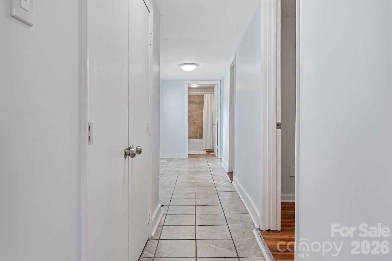 511 Stafford Street Monroe, NC 28110 - Photo 8 of 17 a view of a hallway with a white walls
