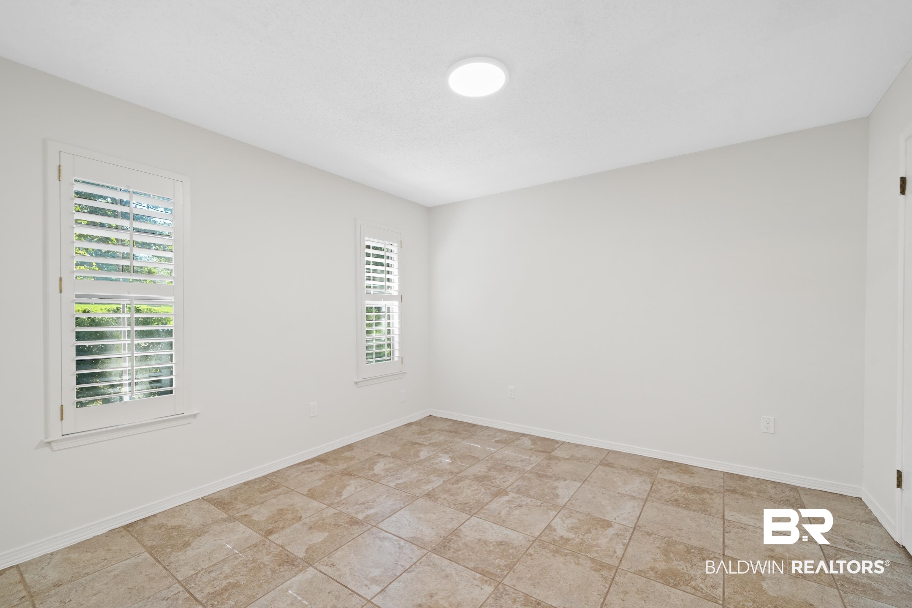 306 Liberty Street Fairhope, AL 36532 - Photo 22 of 32 Plantation shutters on ALL windows.