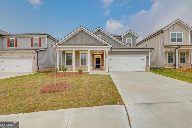 front view of a house with a yard