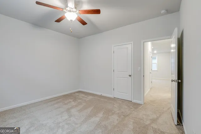 a house with swimming pool in front of it