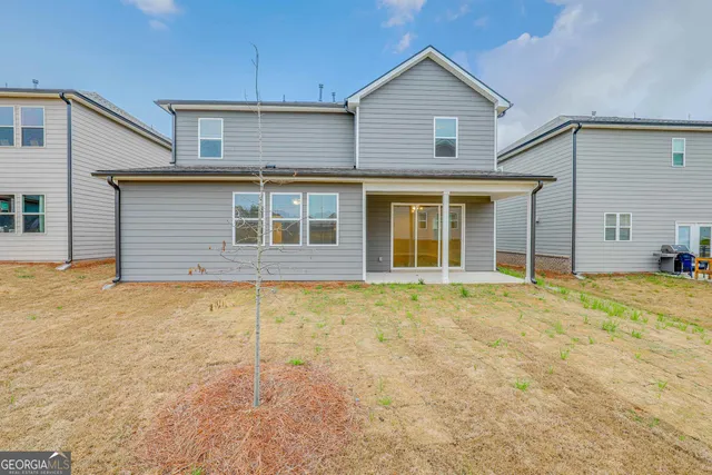 a view of a house with a patio