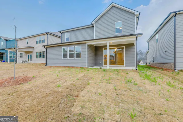 a view of a park with large trees