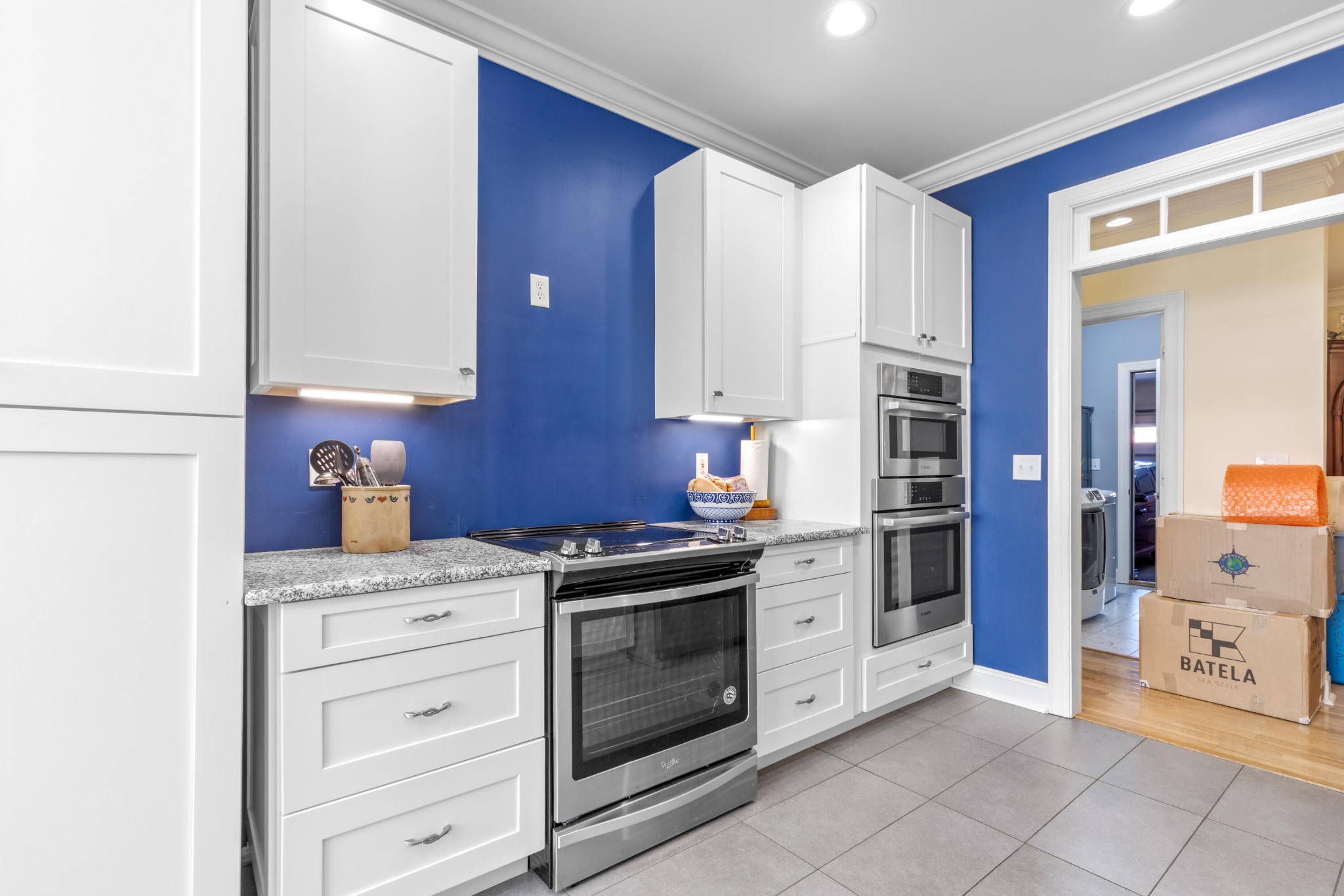 59 Honeysuckle Drive Rock Spring, GA 30739 - Photo 13 of 63 a kitchen with stainless steel appliances granite countertop a stove and a refrigerator