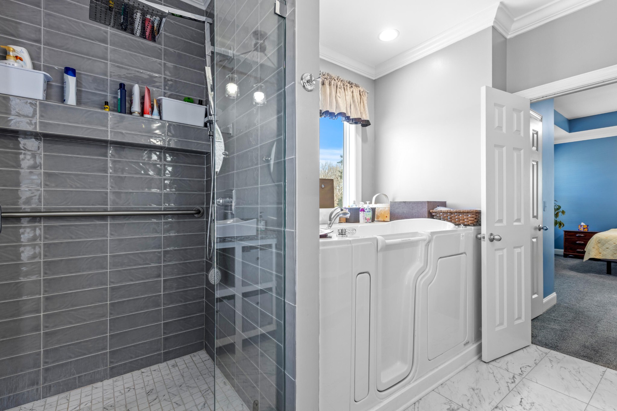 59 Honeysuckle Drive Rock Spring, GA 30739 - Photo 20 of 63 a bathroom with a sink a toilet and shower