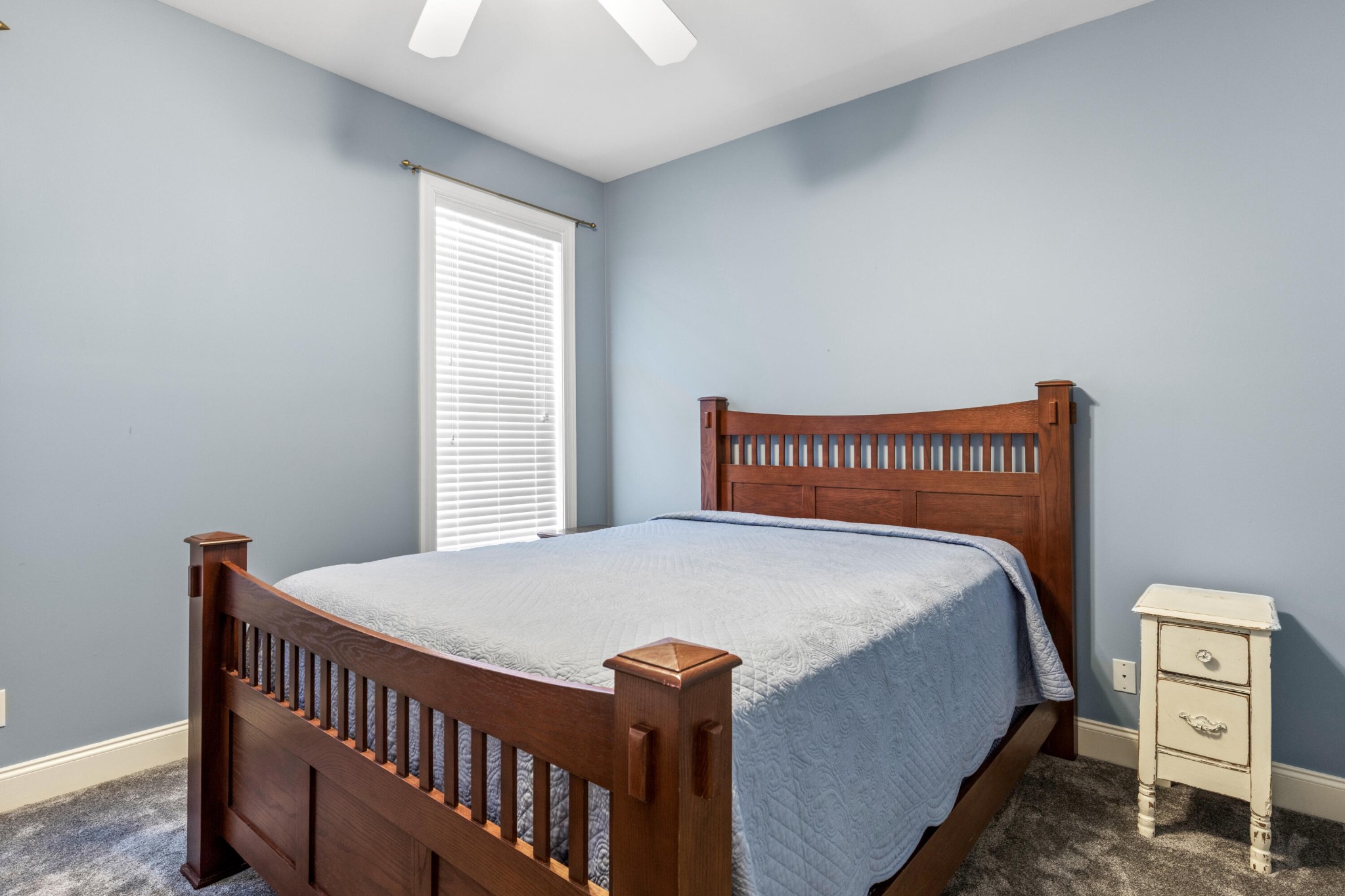 59 Honeysuckle Drive Rock Spring, GA 30739 - Photo 25 of 63 a bedroom with a bed and a window