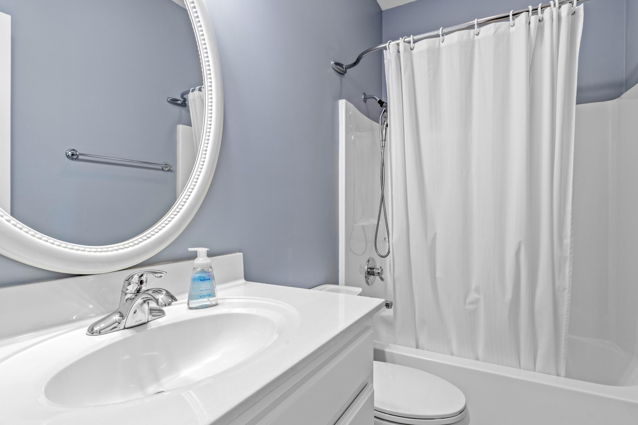 59 Honeysuckle Drive Rock Spring, GA 30739 - Photo 26 of 63 a bathroom with a sink toilet and shower