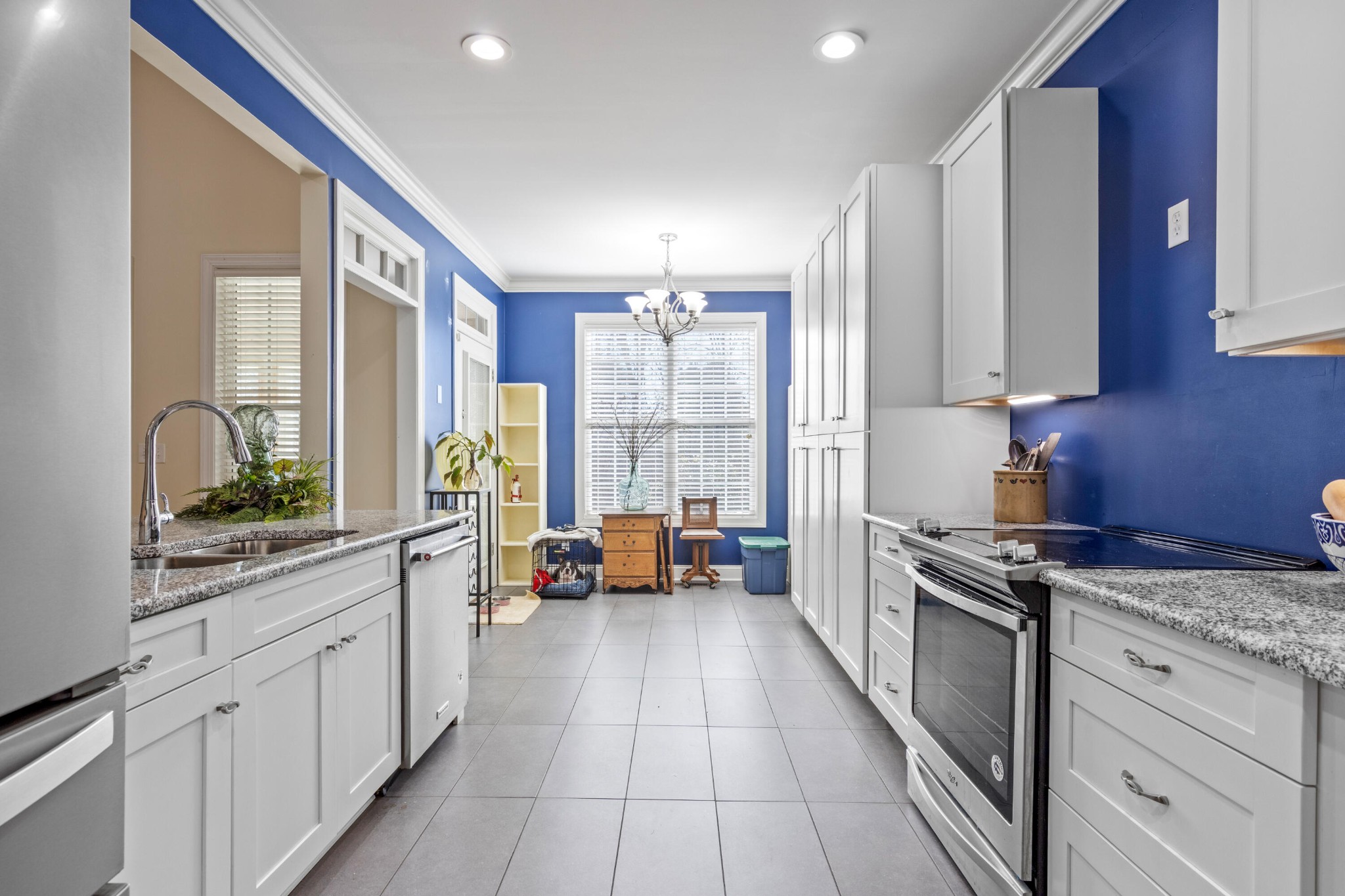 59 Honeysuckle Drive Rock Spring, GA 30739 - Photo 4 of 63 a kitchen with stainless steel appliances granite countertop a stove a sink and a refrigerator