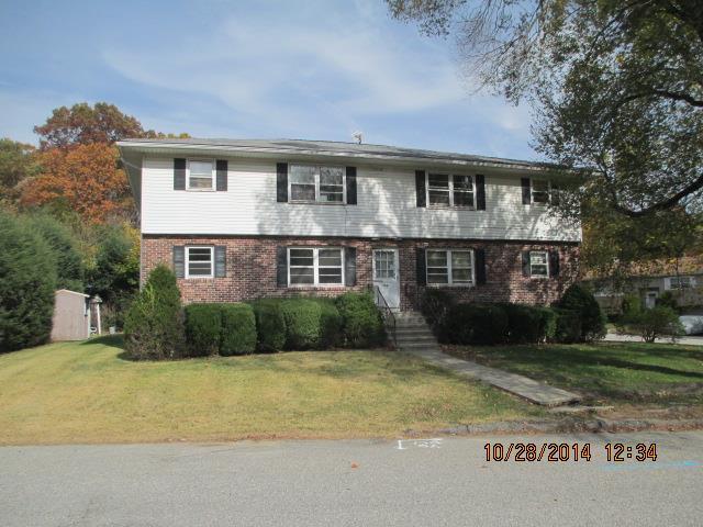 130 Kaynor Drive Waterbury, CT 06708 - Photo 1 of 1 a front view of a house with a yard