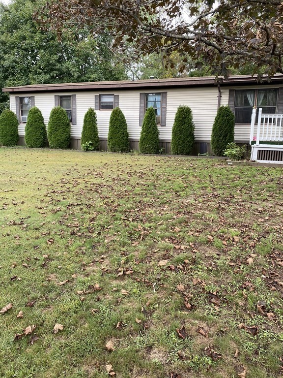 48 Gould Road Ware, MA 01082 - Photo 1 of 37 a view of house with yard and plants