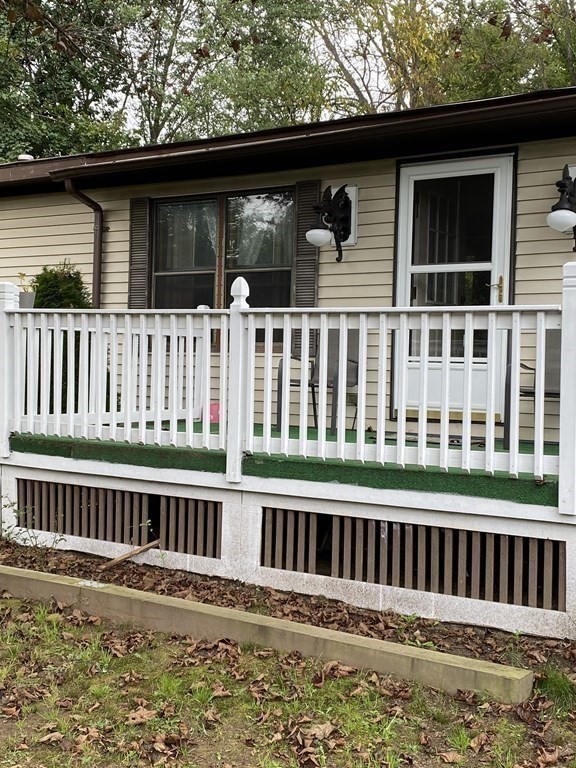 48 Gould Road Ware, MA 01082 - Photo 11 of 37 a balcony view with a garden space