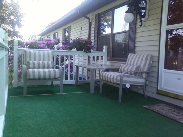 48 Gould Road Ware, MA 01082 - Photo 12 of 37 a view of a chair and tables in the back yard of the house