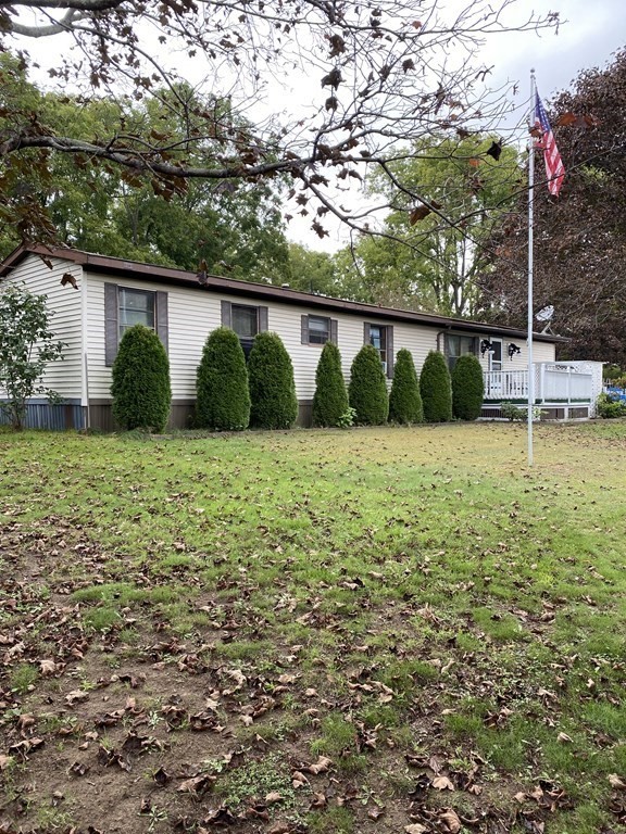 48 Gould Road Ware, MA 01082 - Photo 2 of 37 a view of a house with a yard and a large tree