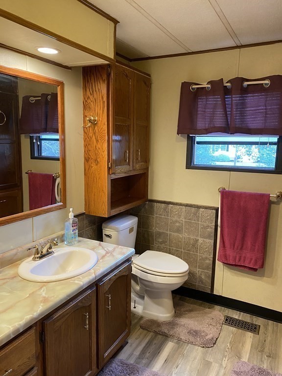 48 Gould Road Ware, MA 01082 - Photo 24 of 37 a bathroom with a sink and a mirror