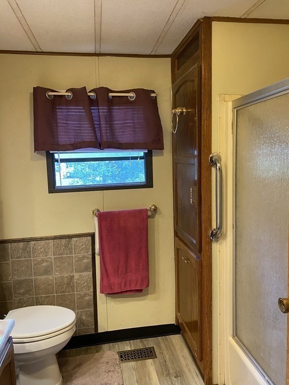 48 Gould Road Ware, MA 01082 - Photo 25 of 37 a bathroom with a toilet and a shower