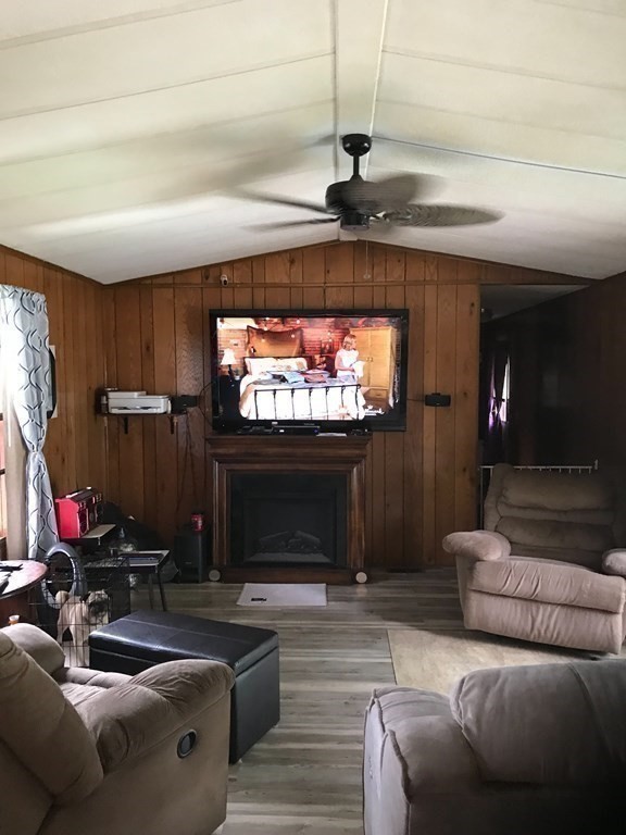 48 Gould Road Ware, MA 01082 - Photo 30 of 37 a living room with furniture and a fireplace