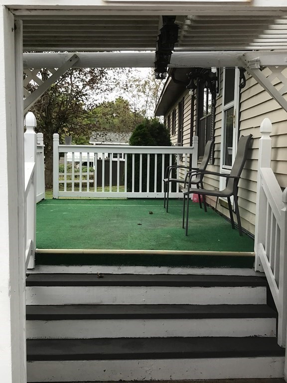 48 Gould Road Ware, MA 01082 - Photo 10 of 37 a view of a porch and a yard