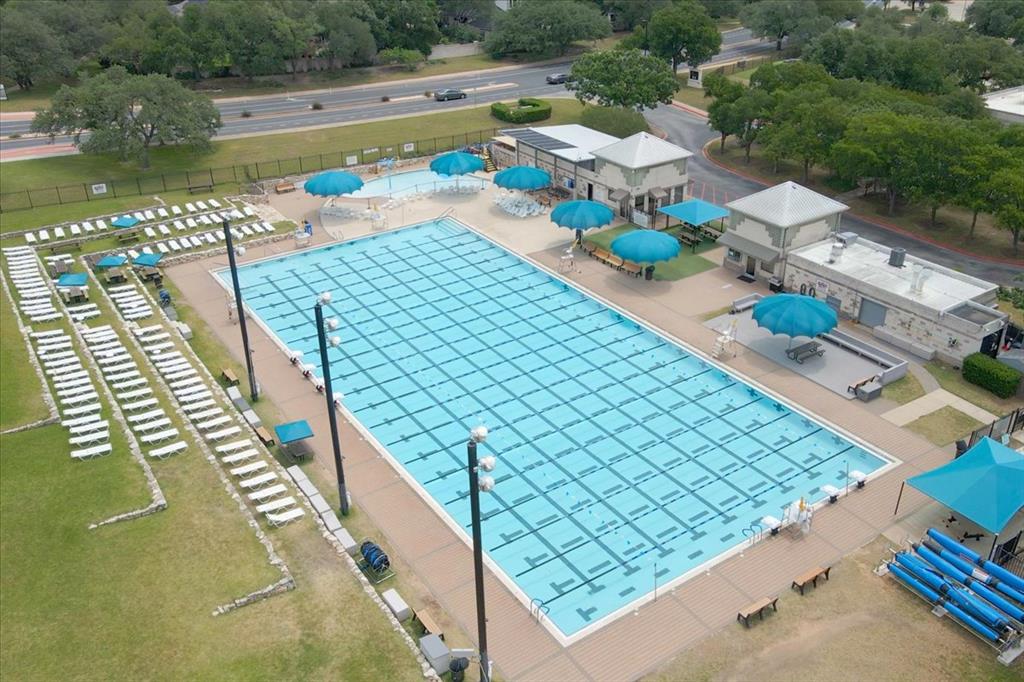 11129 Bastogne Loop Austin, TX 78739 - Photo 34 of 40 Four pools in the community means everyone has a favorite. The Olympic size pool serves residents year round.