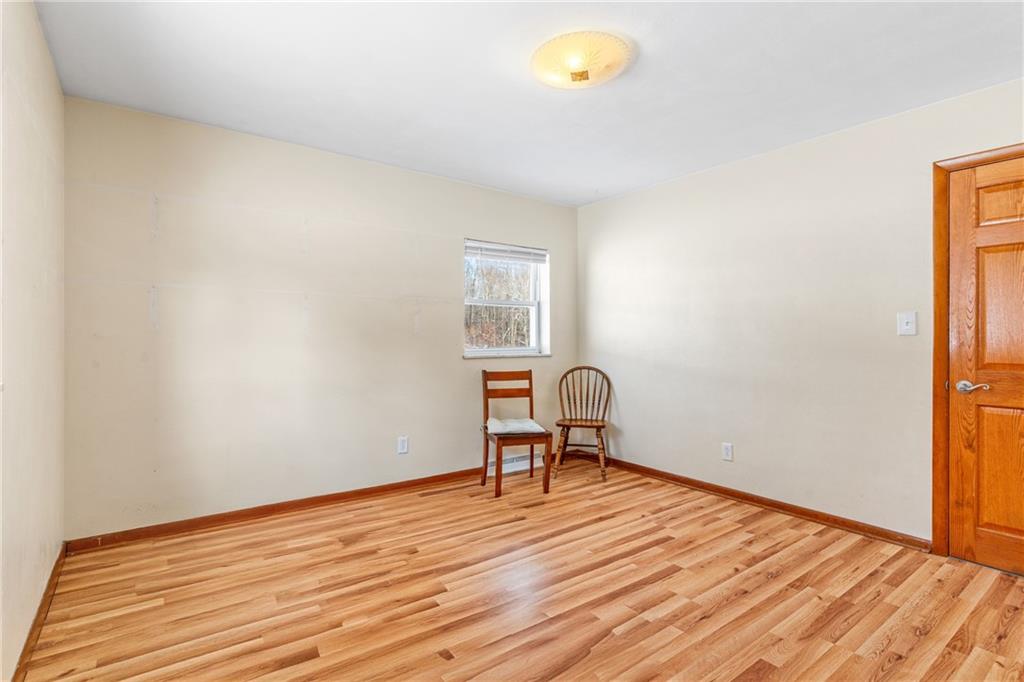 316 Noll Road Georgetown, PA 15043 - Photo 21 of 48 a view of a room with wooden floor and bench