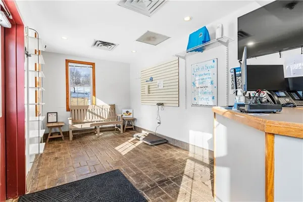 a living room with a couch and a flat screen tv